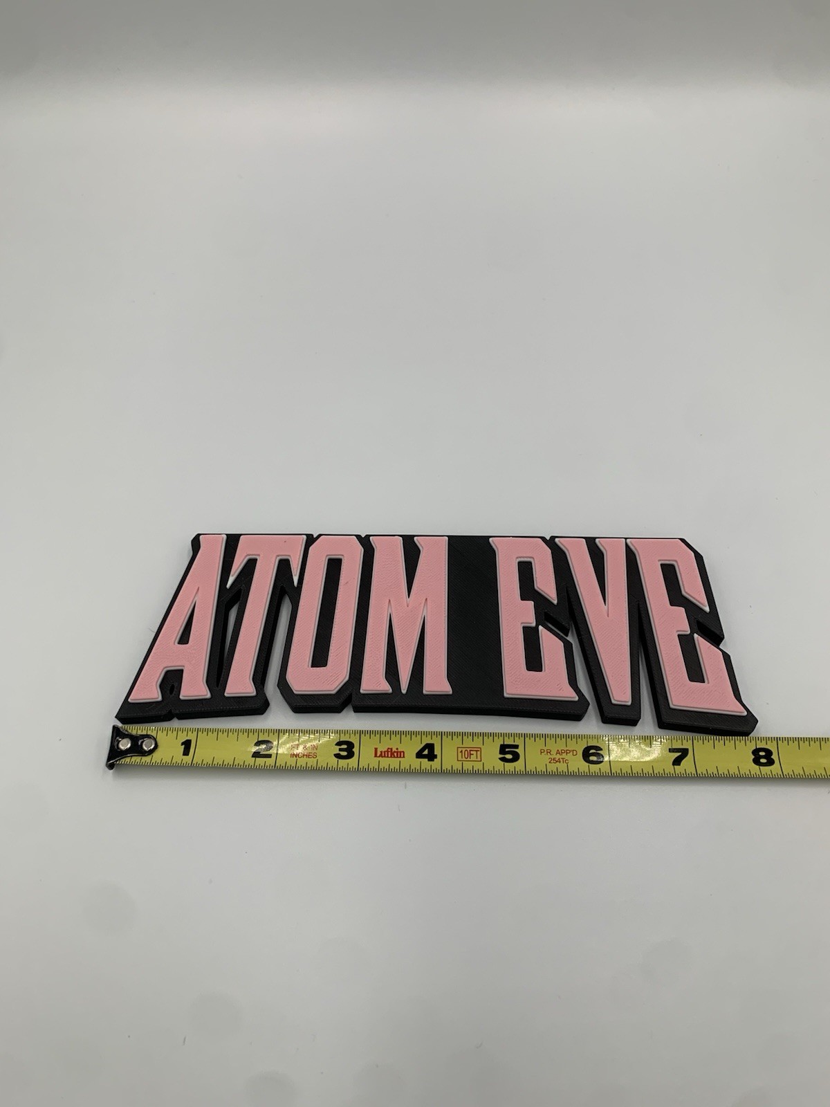 Atom Eve Sign gallery