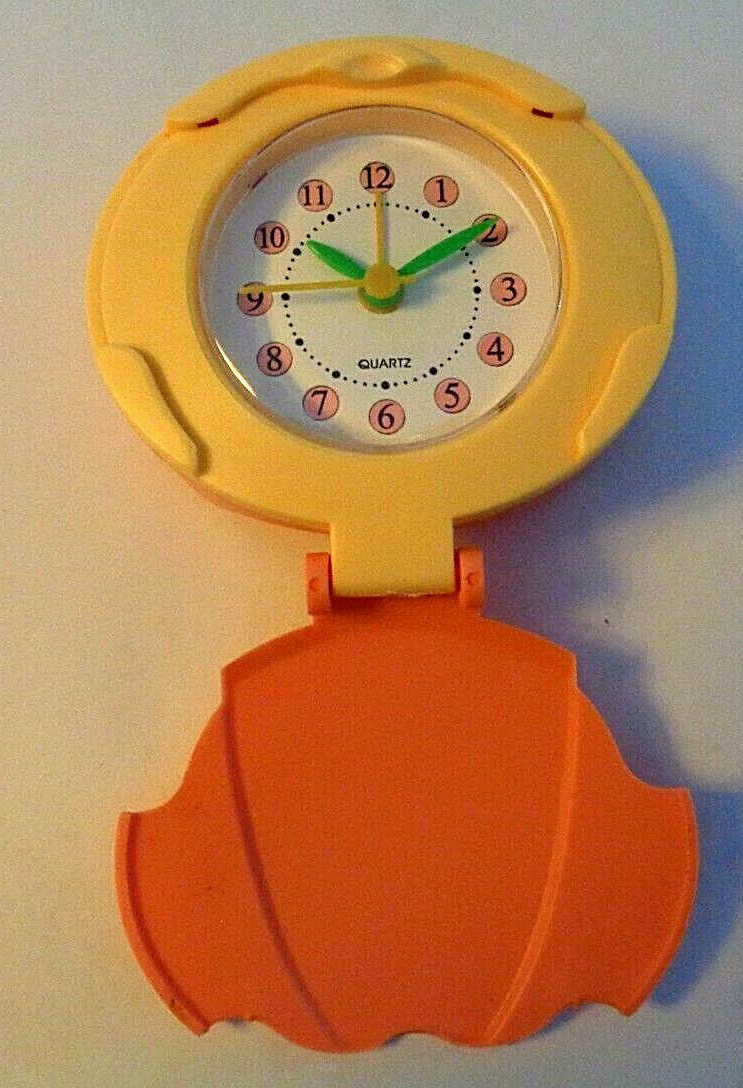 OVAL Quartz Alarm Clock * Yellow Face & Orange Body * 3 AA Batteries gallery
