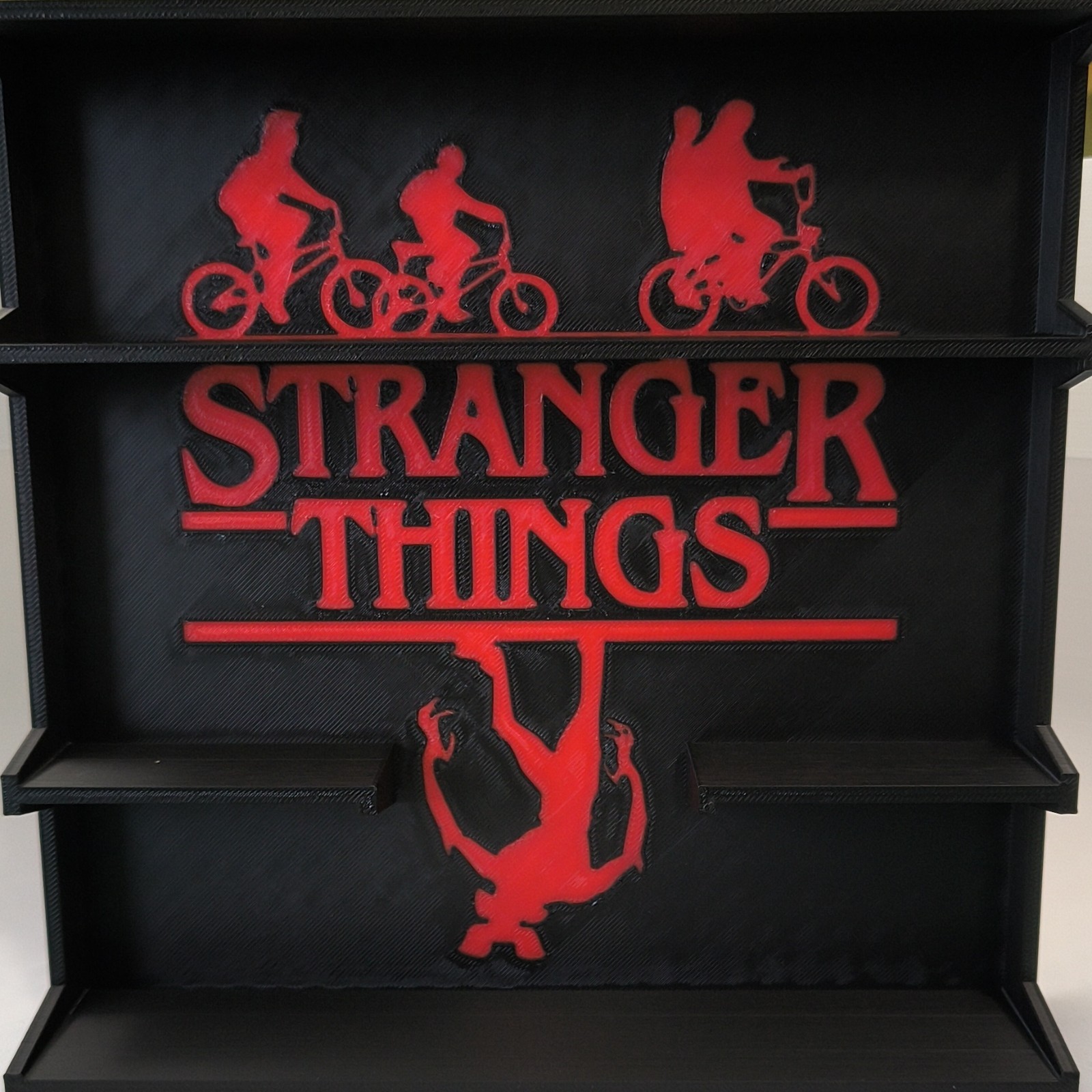 Stranger Things assorted lot with display shelf gallery