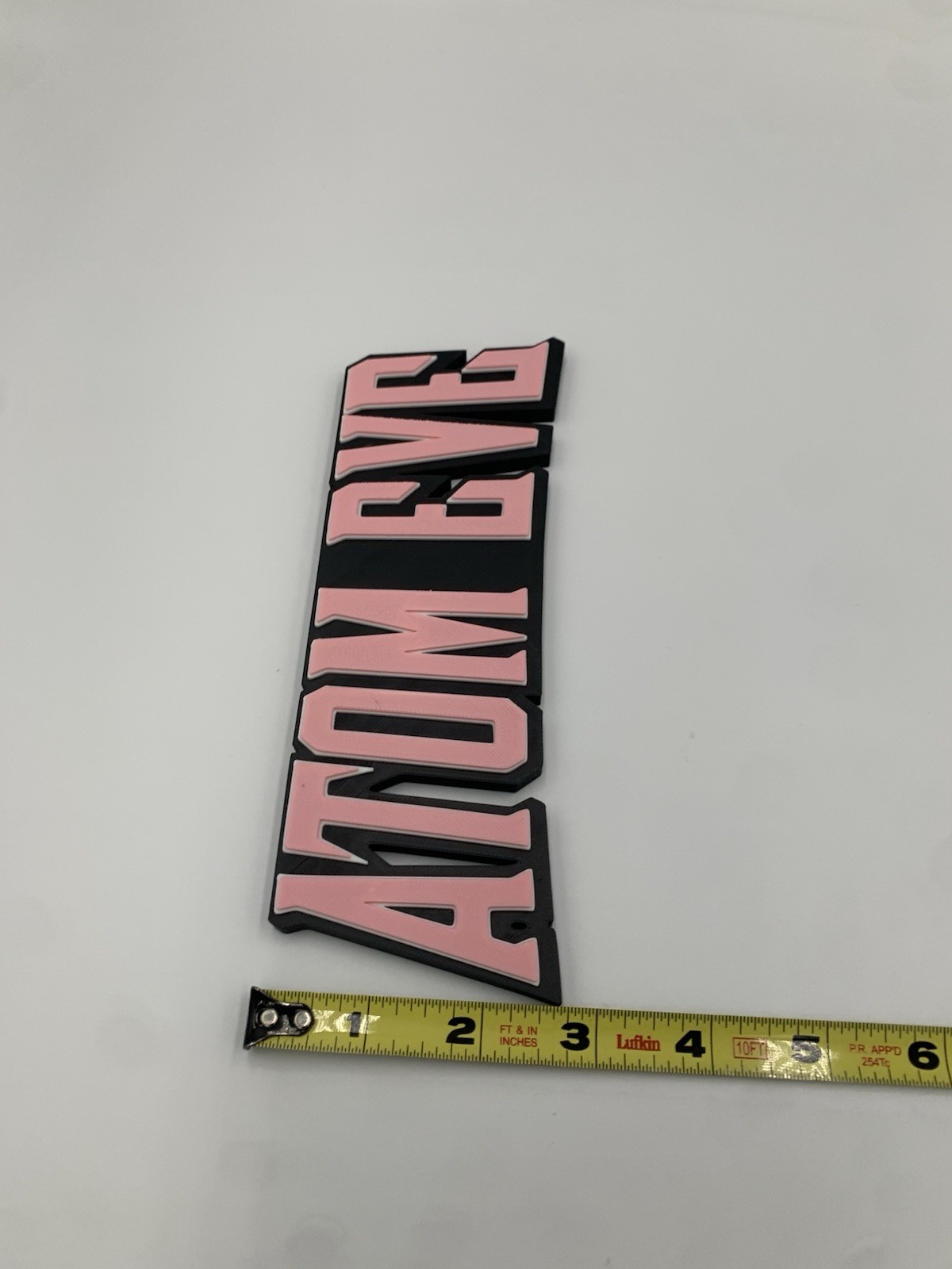 Atom Eve Sign gallery