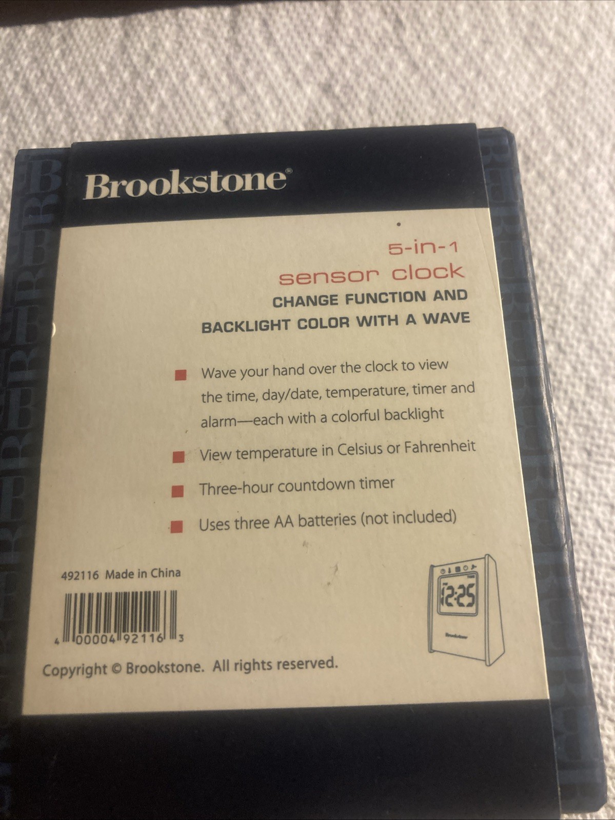 Unused Brookstone 5-in-1 Sensor Clock, New In Box gallery