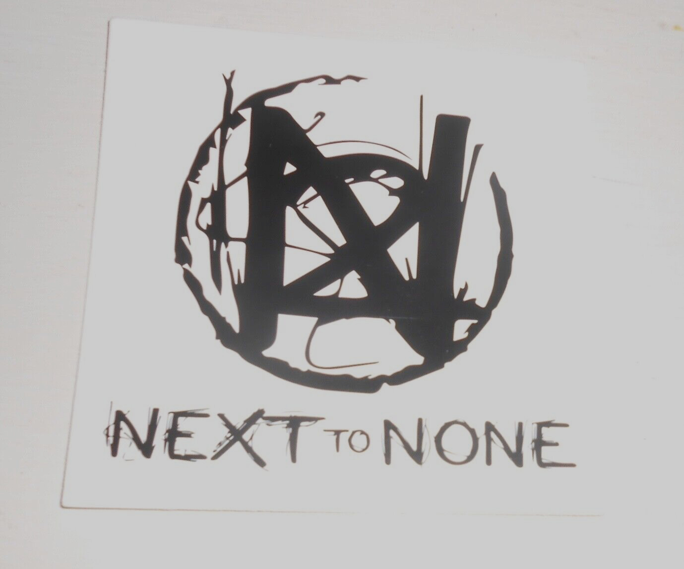 Next to None Sticker (square) 4x4 Death Metal gallery