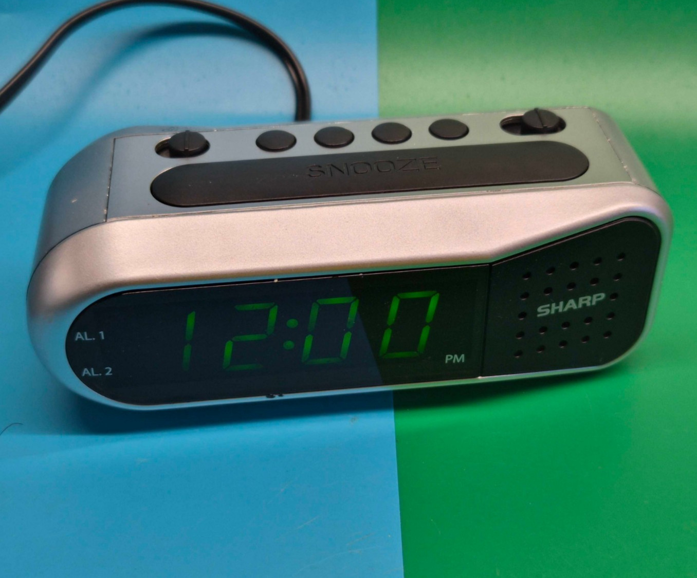 Sharp Digital Small Alarm Clock LED Display Battery Backup Snooze Model SPC100 gallery